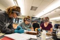 Students working during class in a chemistry lab